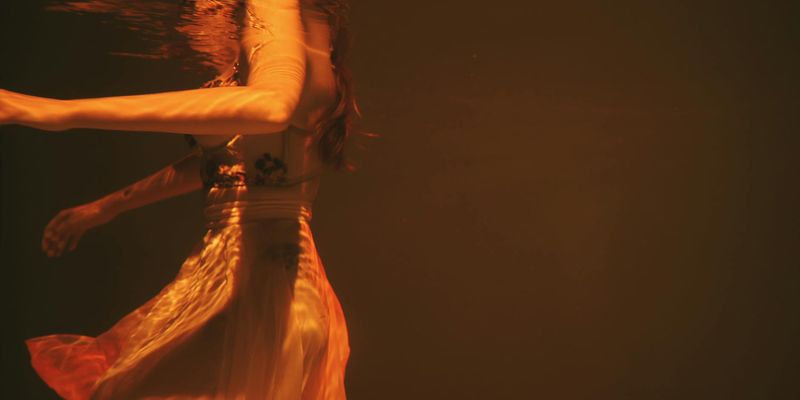 A person captured mid-movement, showing fluidity and grace.